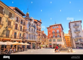 photo of summer view of Teruel with landmarks (Cathedral of Santa María de Mediavilla, Mausoleum of the Amantes) in Aragon, Spain.