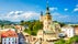 Photo of view of main square in Banska Bystrica, Slovakia from above during summer day with historical fortification.