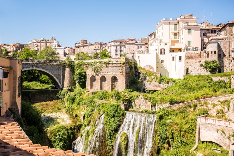 Beautiful park of Villa Gregoriana and charming buildings in Tivoli, Italy