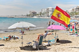 photo of aerial panoramic drone point of view Cabo Roig coastline with blue Mediterranean Seascape view, residential buildings near sandy beach at sunny summer day. Province of Alicante, Costa Blanca. Spain.