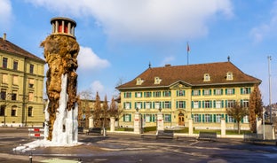 Bern, Switzerland. View of the old city center and Nydeggbrucke bridge over river Aare.