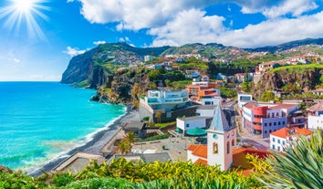 Aerial drone view of Camara de Lobos village, Madeira.