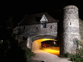 Photo of historic town houses at night on Quay Side in Norwich, Norfolk, United Kingdom.