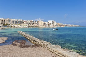 Photo of panoramic aerial view of St. Paul bay with acropolis of Lindos in background ,Rhodes, Greece.