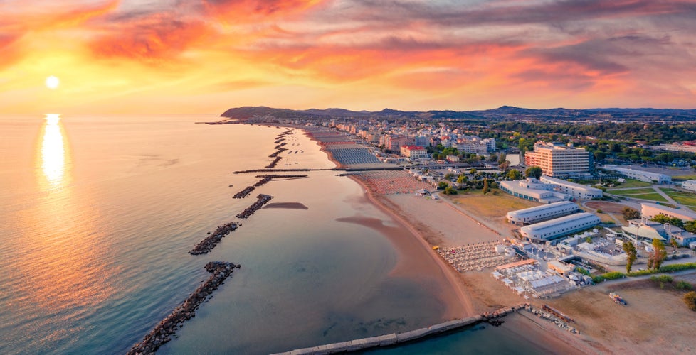 photo of view of Sunny summer view from flying drone of Cattolica town, Province of Rimini. Fantastic sunrise on east coast of Adriatica sea, Italy.