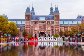 Amsterdam Netherlands dancing houses over river Amstel landmark in old european city spring landscape.