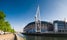 Summer sun over the River Taff and Millennium sports stadium in Cardiff.