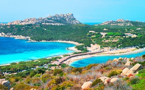 Photo of Bizarre granite rock and azure bay in beautiful beach at Capo Testa, Sardinia, Italy.