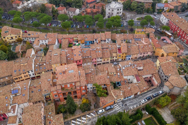 Photo of aerial view of colorful medieval Italian houses with red roofs in Cesena, Cesena Forli provice, Emilia Romagna Italy.