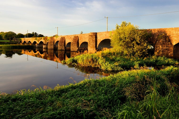 photo of  view  of Old stones bridge, Ireland, the bridge over the River Shannon.