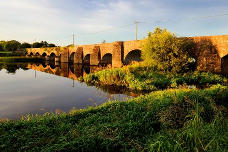 photo of  view  of Old stones bridge, Ireland, the bridge over the River Shannon.