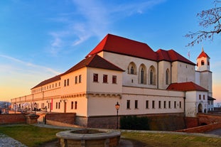 Photo of aerial view on Mikulov town in Czech Republic with Castle and bell tower of Saint Wenceslas Church.