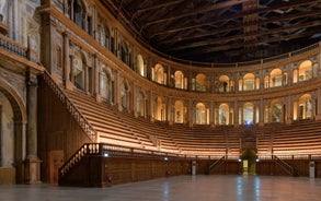 Photo of panorama of Parma cathedral with Baptistery leaning tower on the central square in Parma town in Italy.