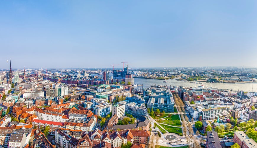 Photo of cityscape of Hamburg from the famous tower Michaelis with view to the city and the harbor.