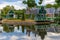 Photo of water reflection of a traditional Dutch building at Arnhem open air and national heritage museum, in Arnhem, Netherlands.