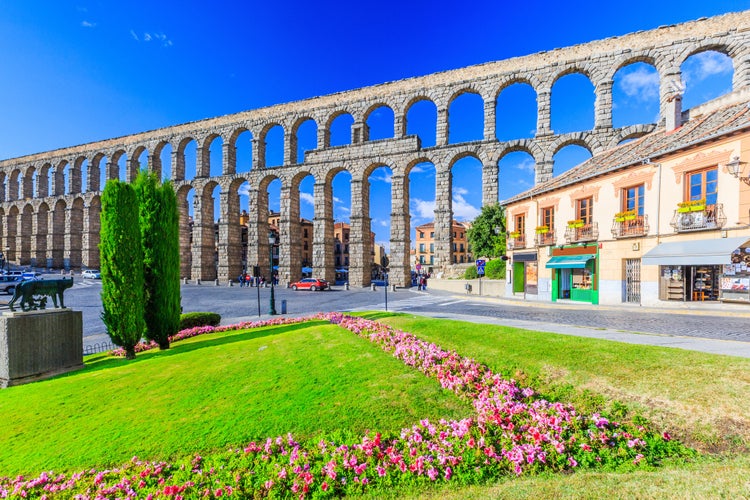 Photo of Segovia, Spain. View at Plaza del Azoguejo and the ancient Roman aqueduct.