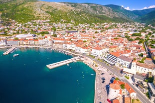 photo of  Pláž Senj it's a small beach hidden by vegetation near the Adriatic Sea, Senj, Croatia.