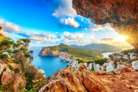 Photo of aerial view of Alghero on a beautiful day with harbor and open sea, Italy.