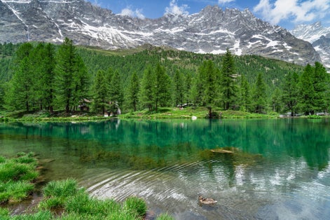 The scenic Blue Lake (Lago Blu) surrounded by a beautiful alpine landscape near Cervinia, Aosta Valley, Italy