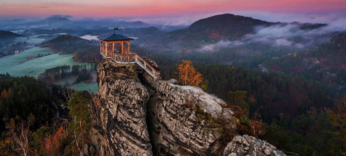 Viewing platform atop sandstone cliffs at Bohemian Switzerland National Park in Czechia in July..jpg