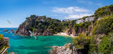 Photo of panoramic aerial view of beautiful Blanes in Costa Brava on a beautiful summer day, Spain.