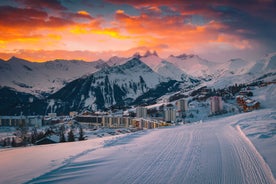 photo of an aerial view of winter landscape and ski resort in the Alps, La Toussuire, France, Europe.