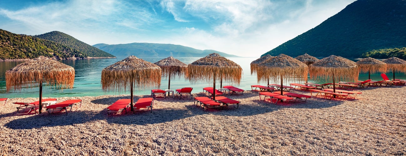 Panoramic morning view of Antisamos Beach. Captivating spring seascape of Ionian Sea. Romantic outdoor scene of Kefalonia island, Sami town location, Greece, Europe. Traveling concept background.