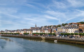 photo of Port of Deauville and city skyline in a sunny summer day, Normandy, France.