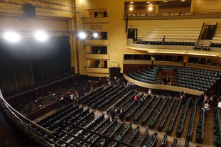 Porto, Portugal old town ribeira aerial promenade view with colorful houses, Douro river and boats.