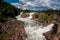 photo of Trollhättan Falls full of water in Trollhättan, Sweden.