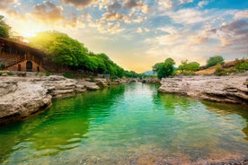 Photo of aerial view of the old bridge and river in city of Mostar, Bosnia and Herzegovina.