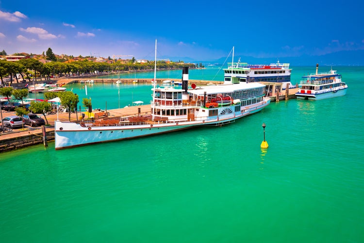 Lago di Garda tourist boats in Peschiera del Garda harbor, Veneto region of Italy