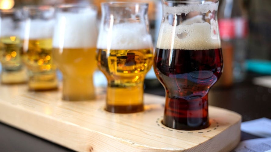 Beer tasting at the Carlsberg Brewery in Copenhagen, featuring a variety of craft beers in tasting glasses..jpg