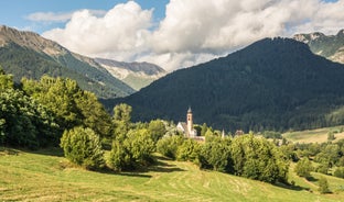 photo of Glimpses of the mountain village of San Giovanni di Fassa, Vigo di Fassa, Val di Fassa, Trento, Trentino Alto Adige, Italy.