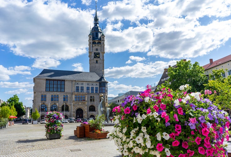 Photo of marketplace with church in dessau east germany .