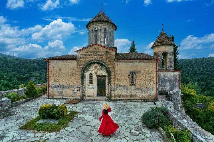 Photo of tourist visiting at Motsameta monastery, Kutaisi, Georgia.