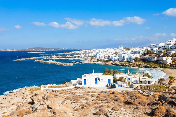 Photo of Parikia town aerial panoramic view with beach, Paros island in Greece.