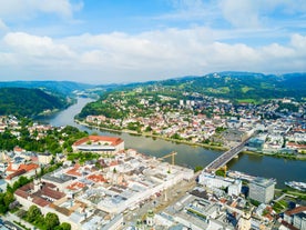 Panoramic view of historic Zurich city center with famous Fraumunster, Grossmunster and St. Peter and river Limmat at Lake Zurich on a sunny day with clouds in summer, Canton of Zurich, Switzerland