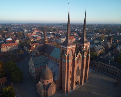 Photo of aerial view of Roskilde Cathedral, church of the Danish royal family in Denmark.