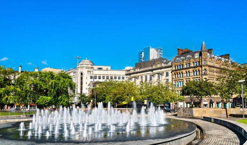 Photo of fountains at Piccadilly garden in Manchester city center, England.