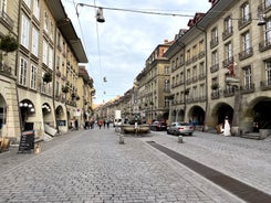 Bern, Switzerland. View of the old city center and Nydeggbrucke bridge over river Aare.