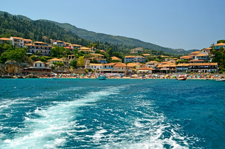 photo of view of Agios Nikitas Lefkas Greece from boat.