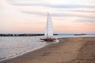 Photo of amazing landscape with beautiful sea beach on sunset in Viserbella, Italy.