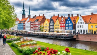 Scenic summer view of Nyhavn pier with color buildings, ships, yachts and other boats in the Old Town of Copenhagen, Denmark