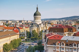 Antique building view in Old Town Bucharest city - capital of Romania and Dambrovita river. Bucharest, Romania, Europe.