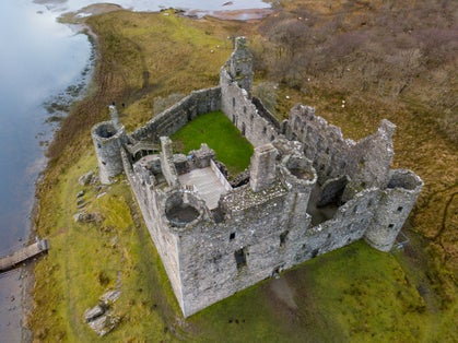 Photo of Aerial view of Kilchurn Castle on Loch Awe in Argyll and Bute, Scottish Highlands .