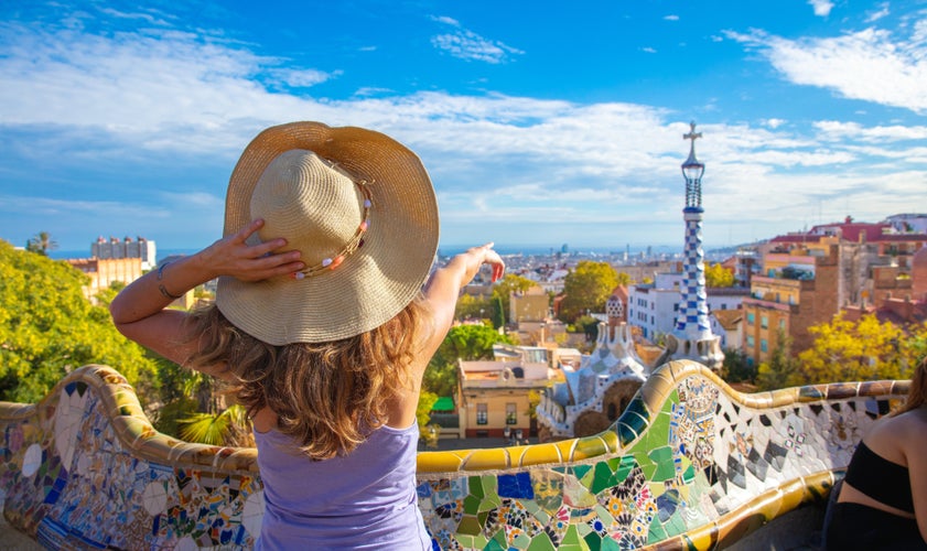 Photo of woman visiting Barcelona city, Spain.