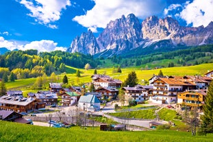 photo of skiing in the Alpe di Siusi with snow in winter, Dolomites, Italy.