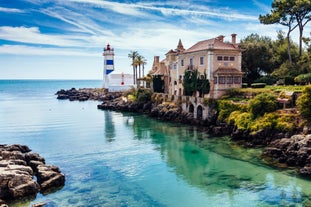 Photo of Carvoeiro fishing village with beautiful beach and colourful houses, Portugal.