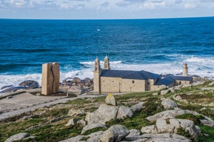 photo of aerial view of a harbor Fisterra is on Cape Finisterre in Galicia, Spain.